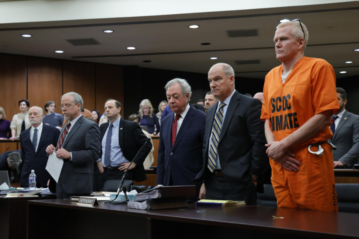 Alex Murdaugh, convicted of killing his wife, Maggie, and younger son, Paul, in June 2021, stands with his defense team during a hearing on a motion for a retrial, Jan. 16, 2024, at the Richland County Judicial Center in Columbia, S.C. Murdaugh is scheduled to be sentenced Monday, April 1, 2024 on financial crime charges. It&rsquo;s likely the last time he will face a judge for punishment.