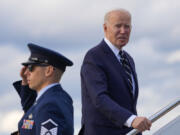 President Joe Biden pauses to respond to a question from a member of the traveling press as he boards Air Force One at Andrews Air Force Base, Md., Friday, April 12, 2024, enroute to New Castle, Del.