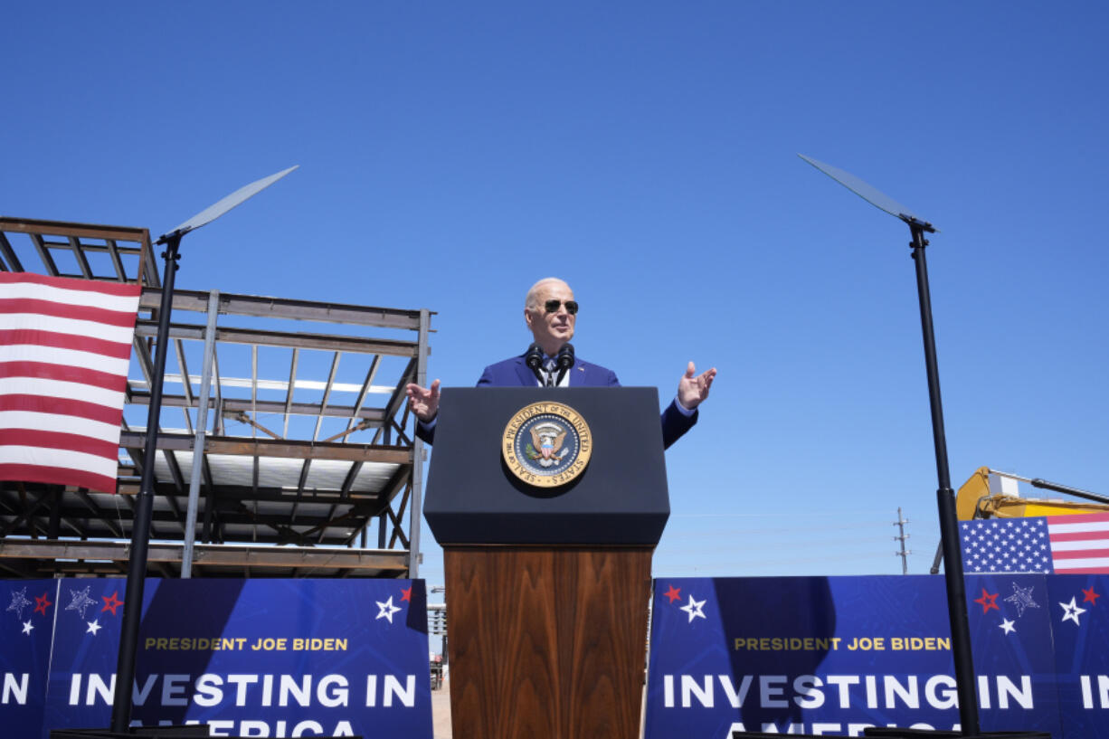FILE - President Joe Biden speaks about an agreement to provide Intel with up to $8.5 billion in direct funding and $11 billion in loans for computer chip plants in Arizona, Ohio, New Mexico and Oregon, at the Intel Ocotillo Campus, March 20, 2024, in Chandler, Ariz. The Biden administration has reached an agreement to provide up to $6.4 billion in direct funding for Samsung Electronics to develop a computer chip manufacturing and research cluster in Texas. The government has previously announced terms to support other chipmakers, including Intel and Taiwan Semiconductor Manufacturing Co., in projects that are spread across the country.