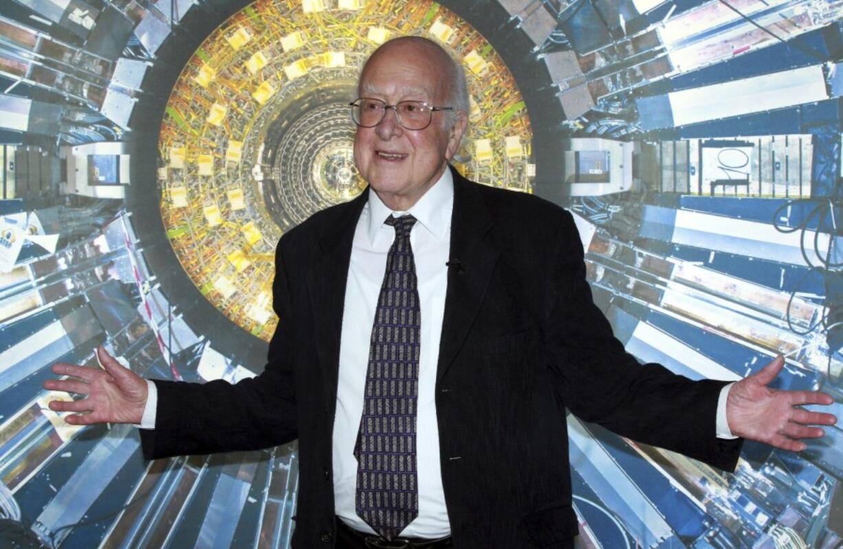 Professor Peter Higgs at the Science Museum, London on Dec. 11, 2013. The University of Edinburgh says Nobel prize-winning physicist Peter Higgs, who proposed the existence of the Higgs boson particle, has died at 94. Higgs predicted the existence of a new particle &mdash; the so-called Higgs boson &mdash; in 1964. But it would be almost 50 years before the particle&rsquo;s existence could be confirmed at the Large Hadron Collider. Higgs won the 2013 Nobel Prize in Physics for his work, alongside Francois Englert of Belgium.