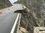 CORRECTS ROAD TO STATE HIGHWAY 1 INSTEAD OF U.S. 1 - n this photo posted on social media by Caltrans District 5, the Rocky Creek closure on California Highway 1 is seen, Sunday, March 31, 2024, in Monterey County, Calif., following heavy rain in the area.