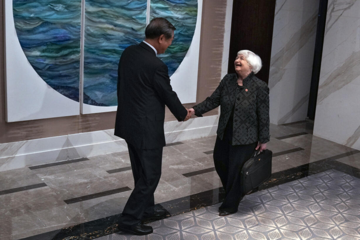 U.S. Treasury Secretary Janet Yellen, right, is greeted by Chinese Vice Premier He Lifeng before heading to a dinner at the White Swan Hotel in southern China&rsquo;s Guangdong province, Friday, April 5, 2024. Yellen has arrived in China for five days of meetings in a country that&rsquo;s determined to avoid open conflict with the United States.