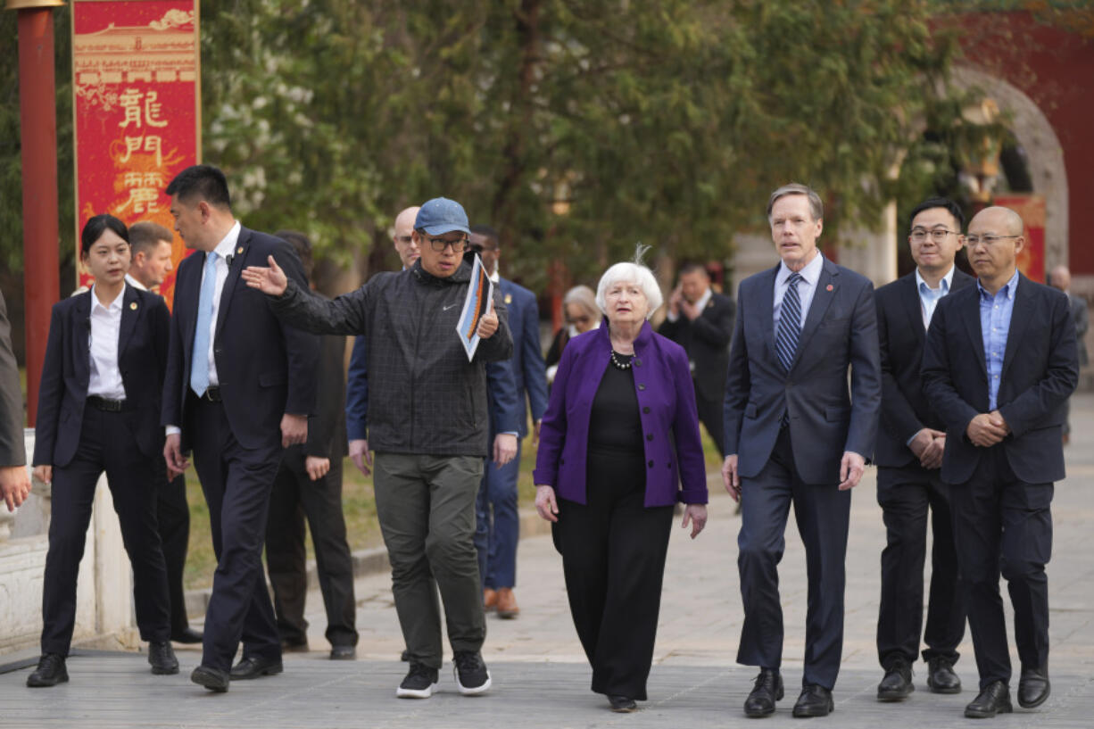 U.S. Treasury Secretary Janet Yellen, center, and U.S. Ambassador to China Nicholas Burns, center right, visit the Guozijian Imperial College site in Beijing, China, Monday, April 8, 2024. The Biden administration will push China to change an industrial policy that poses a threat to U.S. jobs, Treasury Secretary Yellen said Monday after wrapping up four days of talks with Chinese officials.