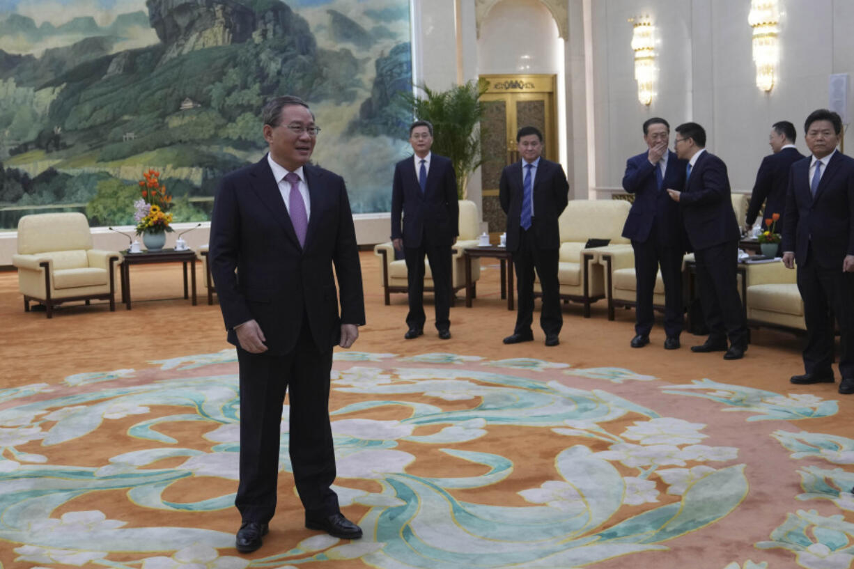 Chinese Premier Li Qiang, left, waits for the arrival of U.S. Treasury Secretary Janet Yellen, unseen for a meeting at the Great Hall of the People in Beijing, China, Sunday, April 7, 2024. Yellen, who arrived later in Beijing after starting her five-day visit in one of China&#039;s major industrial and export hubs, said the talks would create a structure to hear each other&#039;s views and try to address American concerns about manufacturing overcapacity in China.