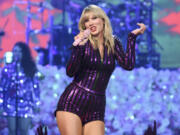 FILE - In this July 10, 2019 file photograph, singer Taylor Swift performs at Amazon Music&rsquo;s Prime Day concert at the Hammerstein Ballroom in New York. Powered by big stadium tours from artists like  Swift and Beyonc&eacute;, ticket sales are booming and it appears likely that live acts will continue to draw massive crowds after the pandemic closed down concert venues globally for close to two years.