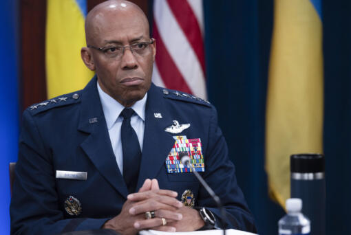 FILE - Chairman of the Joint Chiefs of Staff Air Force Gen. CQ Brown, participates in a virtual Ukraine Defense Contact Group (UDCG) meeting Nov. 22, 2023, at the Pentagon in Washington. Brown is visiting U.S. weapon factories in Oklahoma and Arkansas to address concerns over billions of dollars being sent overseas to Ukraine and other allies when there are so many needs at home.