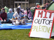 Massachusetts Institute of Technology student Isa Liggans, of Odenton, Md., front left, takes part in Muslim prayer with others Monday, April 22, 2024, at an encampment of tents at MIT, in Cambridge, Mass. Students at MIT set up the encampment of tents on campus to protest what they said was MIT&#039;s failure to call for an immediate ceasefire in Gaza and to cut ties to Israel&#039;s military. U.S. colleges and universities are preparing for end-of-year commencement ceremonies with a unique challenge: providing safety for graduates while honoring the free speech rights of students involved in protests over the Israel-Hamas war.