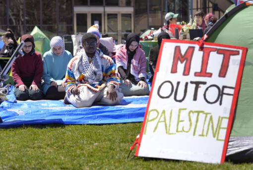 Massachusetts Institute of Technology student Isa Liggans, of Odenton, Md., front left, takes part in Muslim prayer with others Monday, April 22, 2024, at an encampment of tents at MIT, in Cambridge, Mass. Students at MIT set up the encampment of tents on campus to protest what they said was MIT&#039;s failure to call for an immediate ceasefire in Gaza and to cut ties to Israel&#039;s military. U.S. colleges and universities are preparing for end-of-year commencement ceremonies with a unique challenge: providing safety for graduates while honoring the free speech rights of students involved in protests over the Israel-Hamas war.
