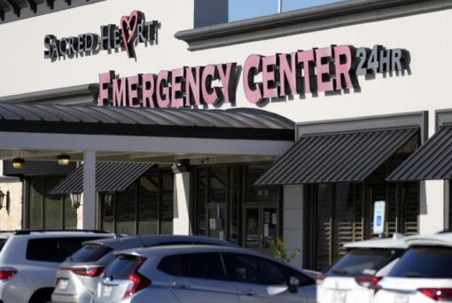 Sacred Heart Emergency Center is pictured Friday, March 29, 2024, in Houston. Complaints about pregnant women being turned away from emergency rooms spiked in the months after states began enacting strict abortion laws following the 2022 U.S. Supreme Court decision overturning Roe v. Wade. At Sacred Heart Emergency Center in Houston, front desk staff refused to check-in one woman after her husband asked for help delivering her baby. She miscarried in a restroom toilet in the emergency room lobby while her husband called 911 for help. (AP Photo/David J.