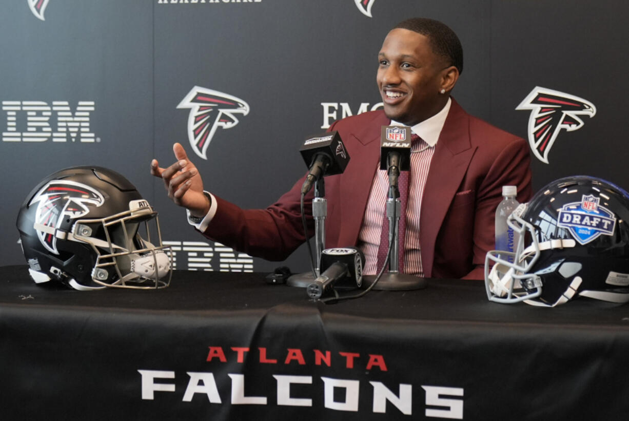Atlanta Falcons first round draft choice quarterback Michael Penix Jr., speaks during a news conference Friday, April 26, 2024, in Flowery Branch, Ga.