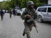 Soldiers deploy outside the Prime Minister&rsquo;s office in Port-au-Prince, Haiti, Thursday, April 25, 2024. A transitional council tasked with selecting a new prime minister and cabinet is expected to be sworn-in on Thursday.