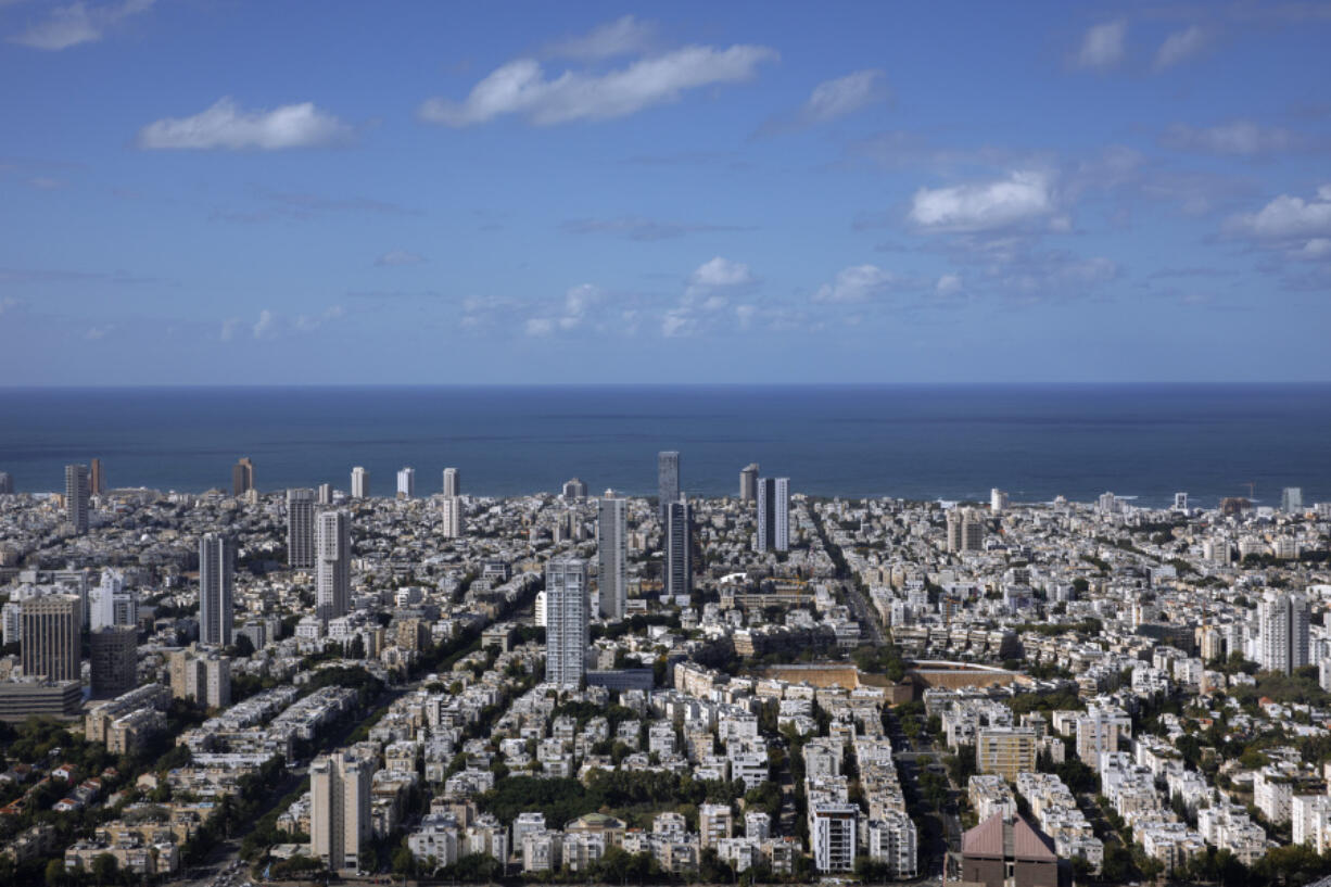 FILE - A general view shows the center of Tel Aviv, Israel, Thursday, Dec. 2, 2021. Prime Minister Benjamin Netanyahu has vowed to shut down Al Jazeera&rsquo;s operations in Israel, calling it a &ldquo;terror channel&rdquo; that spreads incitement, after parliament passed a law clearing the way for the closure.