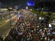 People protest against Israeli Prime Minister Benjamin Netanyahu&#039;s government and call for the release of hostages held in the Gaza Strip by the Hamas militant group in Tel Aviv, Israel, Saturday, April 27, 2024.