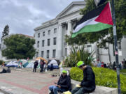 Pro-Palestinian protesters gather Tuesday  in front of Sproul Hall on the campus of the University of California, Berkeley in Berkeley, Calif.