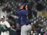 Seattle Mariners starting pitcher Luis Castillo reacts after striking out Colorado Rockies&#039; Nolan Jones to end the seventh inning of a baseball game Saturday, April 20, 2024, in Denver.