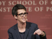 FILE - MSNBC television anchor Rachel Maddow, host of &ldquo;The Rachel Maddow Show,&rdquo; moderates a panel at the John F. Kennedy School of Government, at Harvard University, in Cambridge, Mass., on Oct. 16, 2017. In the past few weeks, NBC reversed a decision to hire former Republican National Committee head Ronna McDaniel as a political contributor following a revolt by some of its best-known personalities, including Maddow, and others.