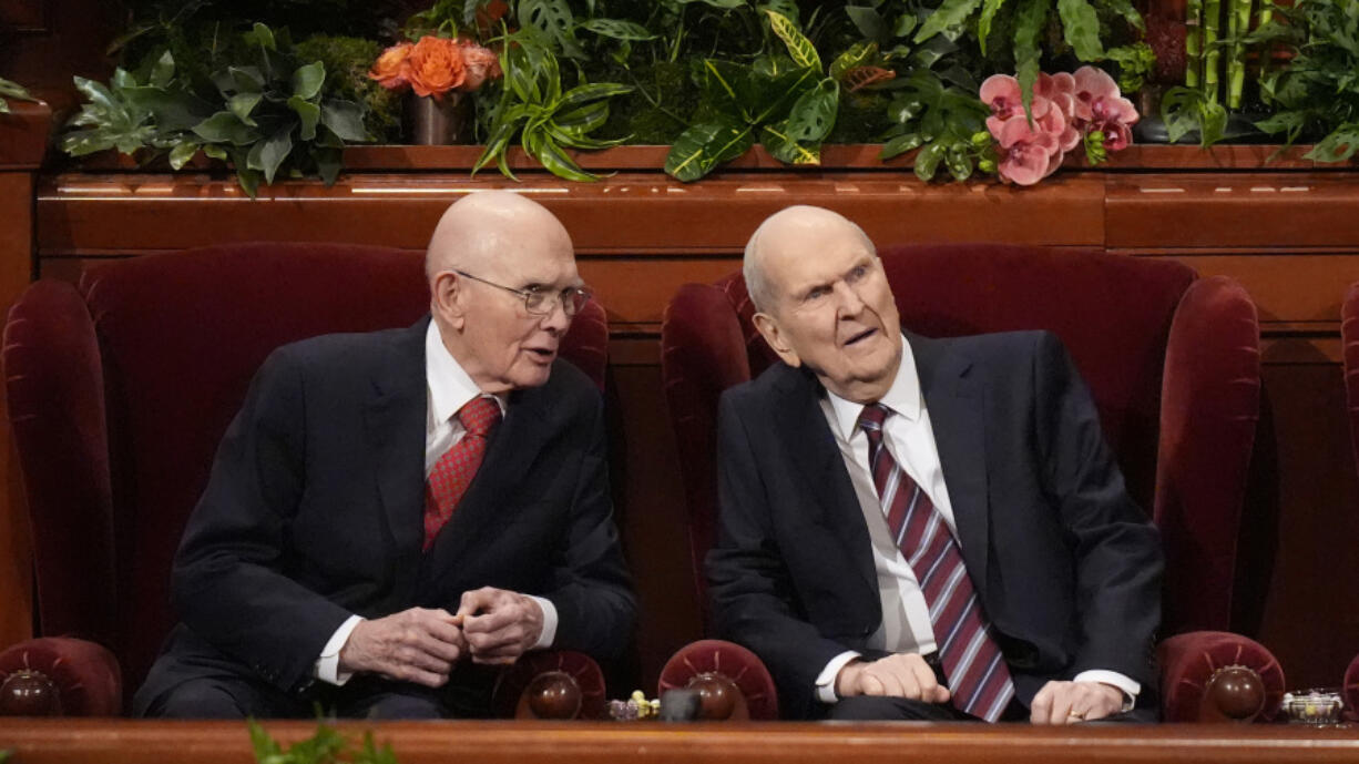 President Russell M. Nelson, right, speaks with counselor Dallin H. Oaks during The Church of Jesus Christ of Latter-day Saints conference, Sunday, April 7, 2024, in Salt Lake City.