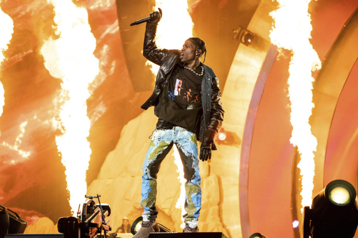 FILE - Travis Scott performs at the Astroworld Music Festival in Houston, Nov. 5, 2021. A judge in Texas is expected hear arguments Monday, April 15 2024, in Scott&rsquo;s request to be dismissed from a lawsuit over the deadly 2021 Astroworld festival.