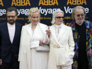 FILE - Members of ABBA, from left, Bjorn Ulvaeus, Agnetha Faltskog, Anni-Frid Lyngstad and Benny Andersson arrive for the ABBA Voyage concert at the ABBA Arena in London, Thursday May 26, 2022. Albums from ABBA, Blondie and the Notorious B.I.G. are entering the National Recording Registry at the Library of Congress.