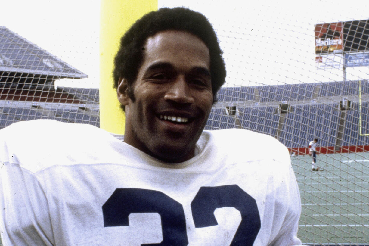 FILE - In this 1977 file photo shows Buffalo Bills NFL Football player O.J. Simpson.