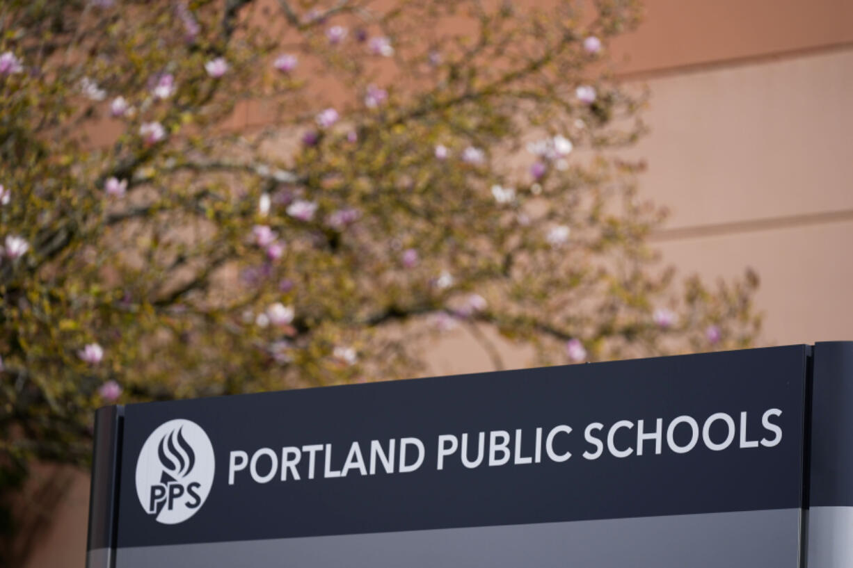The Portland Public Schools district office is seen on Friday, April 5, 2024, in Portland, Ore. A young girl and her guardian have sued an Oregon nonprofit organization, Portland Public Schools and Multnomah County for $9 million, alleging they were negligent when male classmates sexually abused her at school and raped her during an after-school program when she was a nine-year-old third grader.