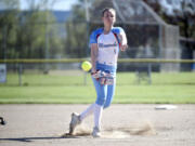 Mark Morris pitcher Makenzie Henthorn throws a warm-up pitch prior to the start of a 2A Greater St. Helens League softball game against Ridgefield on Wednesday, April 17, 2024, in Longview.