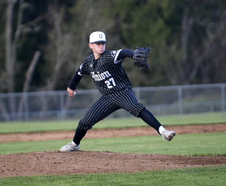 Jacob Chandler of Union delivers a pitch during a 4A Greater St. Helens League baseball game against Skyview at Skyview High School on Tuesday, April 9, 2024.