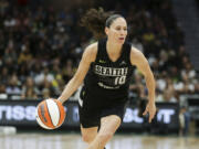 FILE - Seattle Storm guard Sue Bird brings the ball up against the Washington Mystics during the second half of Game 1 of a WNBA basketball first-round playoff series Aug. 18, 2022, in Seattle. The Storm&rsquo;s owners, Force 10 Hoops, said Wednesday, April 24, 2024, that Bird has joined the ownership group. Bird said in a team statement her involvement with the Storm will continue to grow the game. &ldquo;Investing in women&rsquo;s sports isn&rsquo;t just about passion,&rdquo; she said.