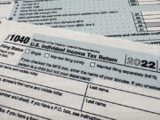 FILE - The Internal Revenue Service 1040 tax form for 2022 is seen on April 17, 2023. The IRS said Friday, April 26, 2024, more than 140,000 taxpayers filed their taxes through its new direct file pilot program. It says the program&#039;s users claimed more than $90 million in refunds, saving roughly $5.6 million in fees they would have spent with commercial tax preparation companies.