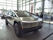 A Tesla Cybertruck is on display at the Tesla showroom in Buena Park, Calif. on Sunday Dec. 3, 2023. Tesla is recalling 3,878 of its 2024 Cybertrucks after it discovered that the accelerator pedal can become stuck, potentially causing the vehicle to accelerate unintentionally and increasing the risk of a crash.
