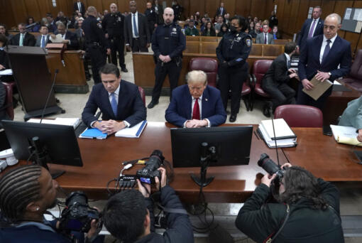Former US President Donald Trump, with lawyer Todd Blanche, left, attends his trial for allegedly covering up hush money payments linked to extramarital affairs, at Manhattan Criminal Court in New York City, Tuesday April 23, 2024. Before testimony resumes Tuesday, the judge will hold a hearing on prosecutors&rsquo; request to sanction and fine Trump over social media posts they say violate a gag order prohibiting him from attacking key witnesses. (Timothy A.