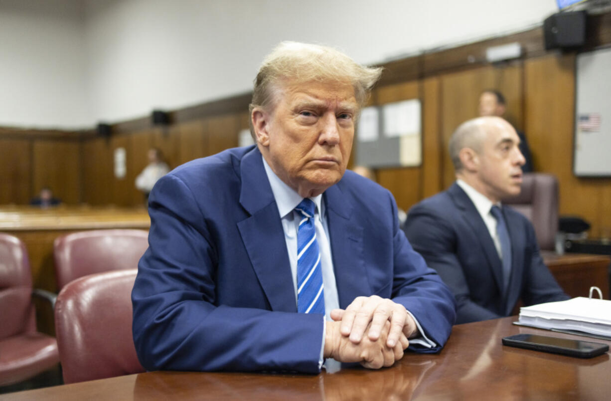 Former President Donald Trump awaits the start of proceedings on the second day of jury selection at Manhattan criminal court, Tuesday, April 16, 2024, in New York. Donald Trump returned to the courtroom Tuesday as a judge works to find a panel of jurors who will decide whether the former president is guilty of criminal charges alleging he falsified business records to cover up a sex scandal during the 2016 campaign.