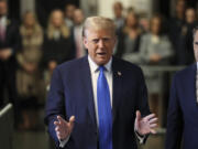 Former president Donald Trump speaks upon arriving at Manhattan criminal court, Monday, April 22, 2024, in New York. Opening statements in Donald Trump&rsquo;s historic hush money trial are set to begin. Trump is accused of falsifying internal business records as part of an alleged scheme to bury stories he thought might hurt his presidential campaign in 2016.