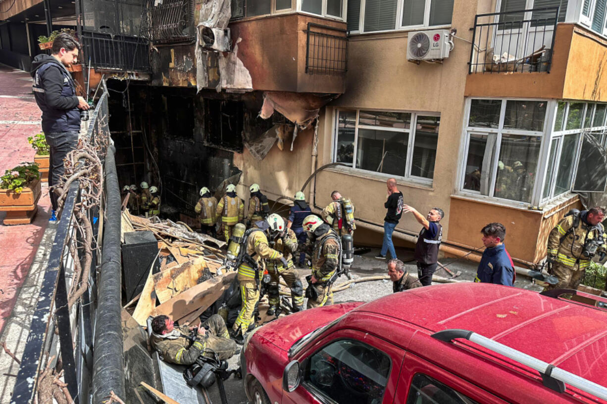 Firefighters work after a fire broke out at a nightclub in Istanbul, Turkey, Tuesday, April 2, 2024. A fire at an Istanbul nightclub during renovations on Tuesday killed at least 27 people, officials and reports said. Several people, including managers of the club, were detained for questioning.
