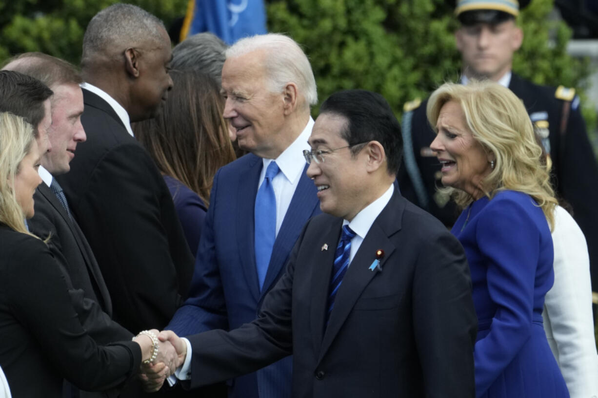 White House national security adviser Jake Sullivan, from third left, and Defense Secretary Lloyd Austin greet President Joe Biden and Japan&#039;s Prime Minister Fumio Kishida as first lady Jill Biden looks on during a State Arrival Ceremony on the South Lawn of the White House, Wednesday, April 10, 2024, in Washington.