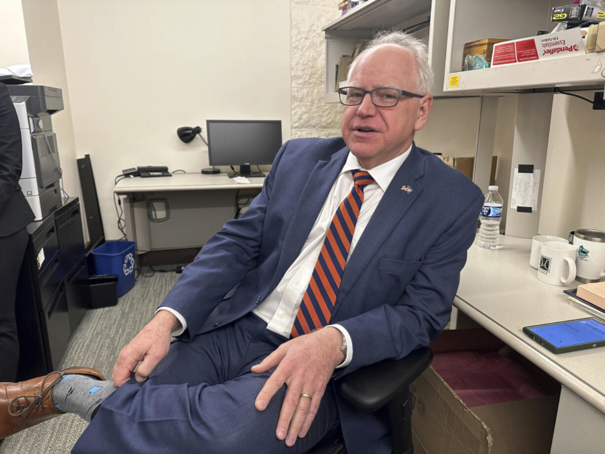 Democratic Minnesota Gov. Tim Walz is photographed in the press room at the State Capitol, on March 13, 2024, in St. Paul, Minn. In an interview with The Associated Press, the Democrat discussed the proposed Minnesota Voting Rights Act, and noted that he signed other measures last year to make voting easier.