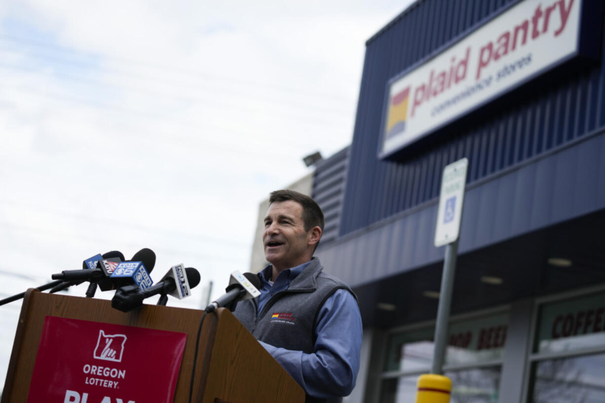 Plaid Pantry President and CEO Jonathan Polonsky speaks during a news conference outside a Plaid Pantry convenience store on Tuesday, April 9, 2024, in Portland, Ore. A ticket matching all six Powerball numbers in Saturday&#039;s $1.3 billion jackpot was sold at the store.