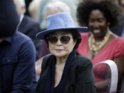 FILE - Yoko Ono appears before the dedication ceremony for her permanent art installation, a sculpture called SKYLANDING, at Jackson Park, Oct. 17, 2016, in Chicago. One of the country&rsquo;s leading artist residency programs, MacDowell, has awarded a lifetime achievement prize to Ono. The groundbreaking artist, filmmaker and musician is the 2024 recipient of the Edward MacDowell Medal, an honor previously given to Stephen Sondheim and Toni Morrison among others.