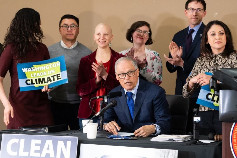 Washington Gov. Jay Inslee signs labor rights and environmental protection bills into law. Thursday, March 25.