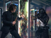Keanu Reeves, left, stars in John Wick: Chapter 4.&rdquo; (Murray Close/Lionsgate)