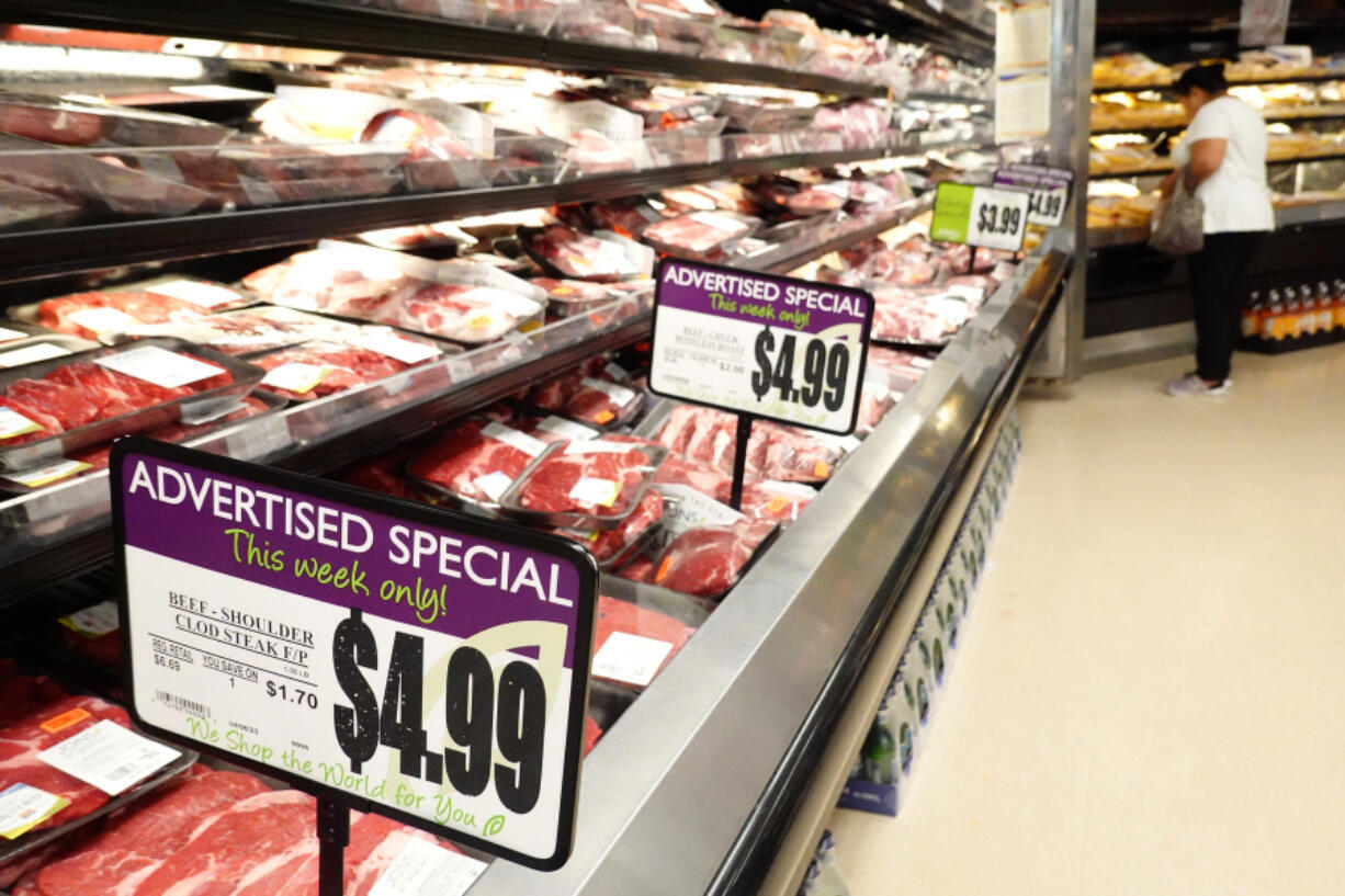 A person shops in the meats section of a grocery store on Sept. 12, 2023, in Los Angeles, California. The Consumer Price Index (CPI) will be released tomorrow showing the latest inflation data and providing perspective on possible future interest rate moves by the Federal Reserve.