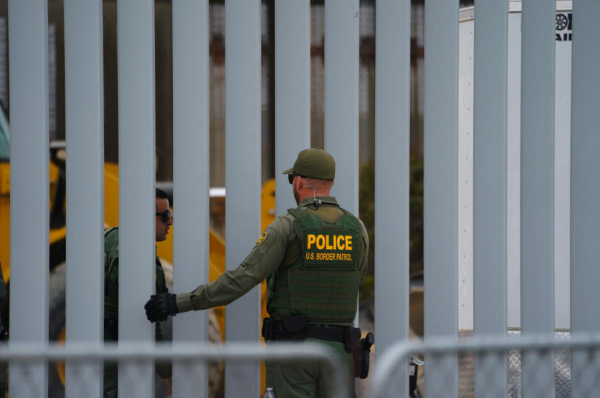 Border Patrol agents work at the U.S. Mexico border at Border Field State Park in San Diego County. (Nelvin C.