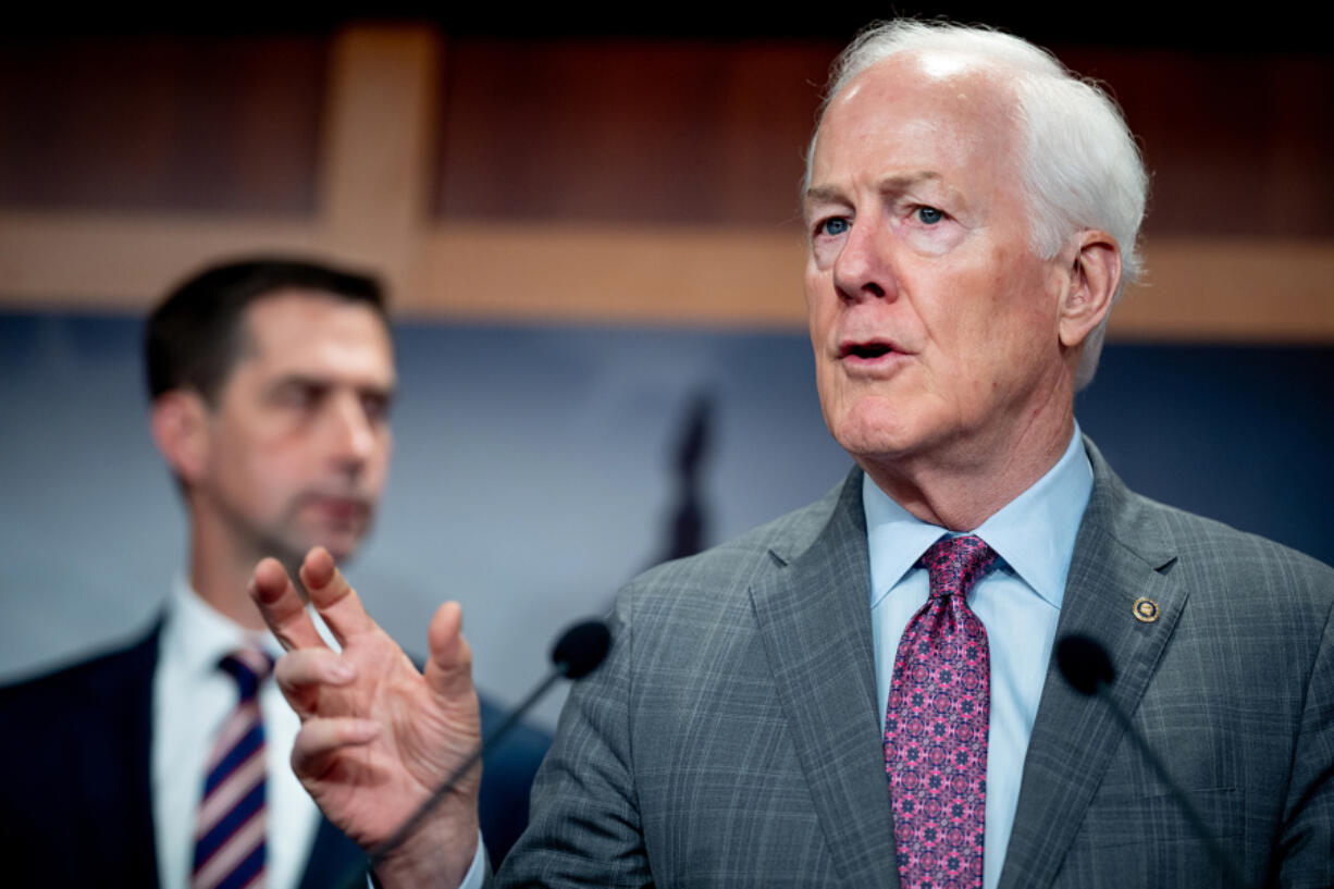 Sen. John Cornyn (R-TX) (right), accompanied by Sen. Tom Cotton (R-AR) (left) speaks during a news conference on Capitol Hill on May 1, 2024, in Washington, D.C.