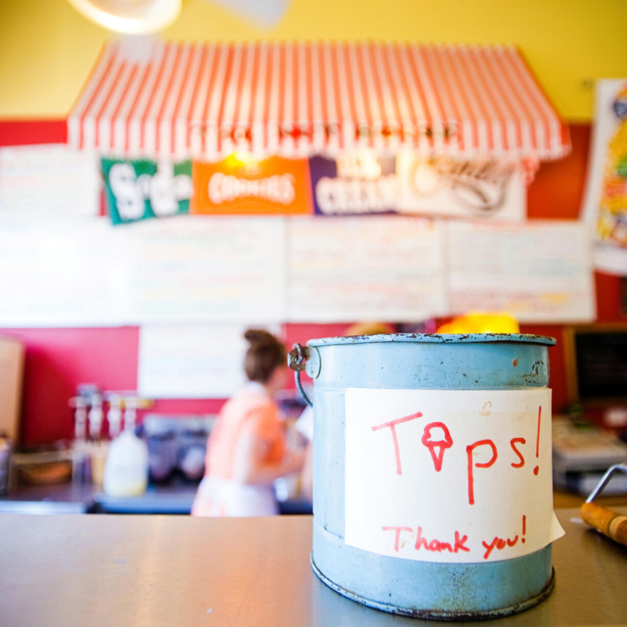 Service charges are separate from tips, sometimes causing confusion once the check arrives.
