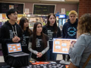 Heritage senior Alex Vo, from left, junior Anna Le, senior Lexi Vo, Clark College freshman Ashlynn Fredendall and Heritage senior Kevin Reyes give an educational presentation about sex trafficking. The group hosts community events in and out of their school.