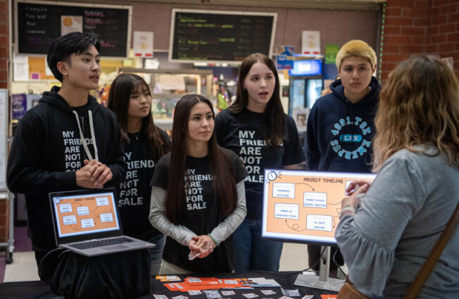 Heritage senior Alex Vo, from left, junior Anna Le, senior Lexi Vo, Clark College freshman Ashlynn Fredendall and Heritage senior Kevin Reyes give an educational presentation about sex trafficking. The group hosts community events in and out of their school.