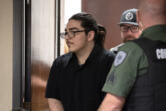 Julio Segura makes his way into the courtroom Monday for his murder trial in the 2022 death of off-duty Vancouver police Officer Donald Sahota at the Clark County Courthouse.