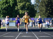 Hudson’s Bay sophomore Paris Ackerman, center, wins the 400 meter dash Thursday, May 9, 2024, during the 2A GSHL Track and Field Championships at Columbia River High School.