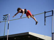 Chase McGee of Camas clears the bar at 15 feet, two inches to win the boys pole vault at the 4A/3A Greater St. Helens League district track and field meet at McKenzie Stadium on Wednesday, May 8, 2024.