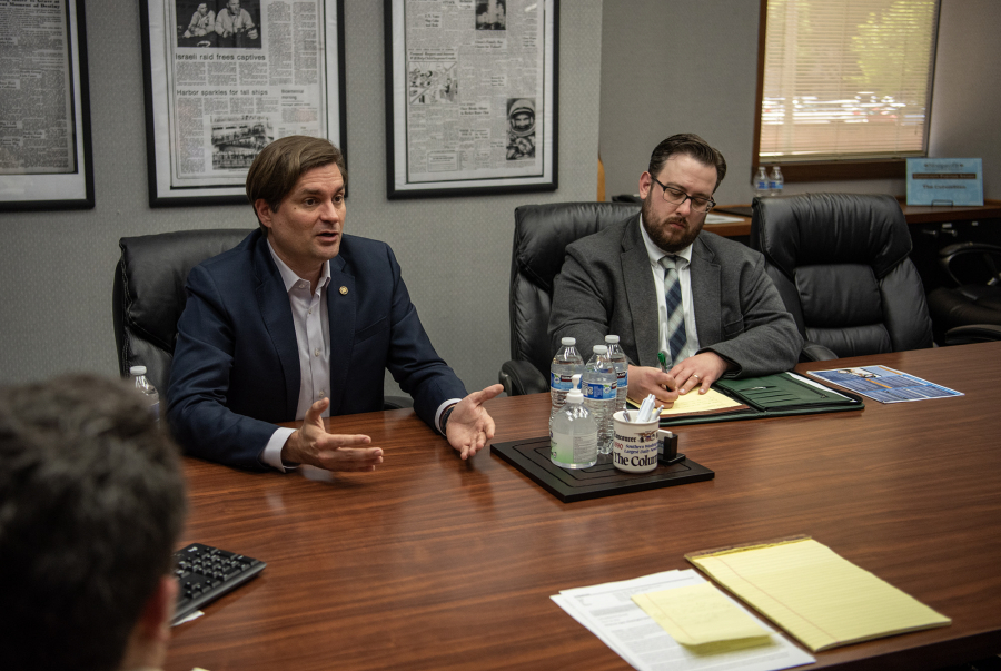 Washington State Treasurer Mike Pellicciotti, left, and his office&rsquo;s communications director, Aaron Sherman, speak with The Columbian&rsquo;s editorial board about Washington Saves.